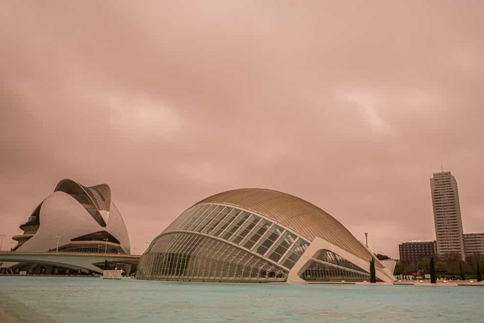 A red and orange tinged sky is seen over the City of Arts and Sciences in Valencia (Europa Press via AP)