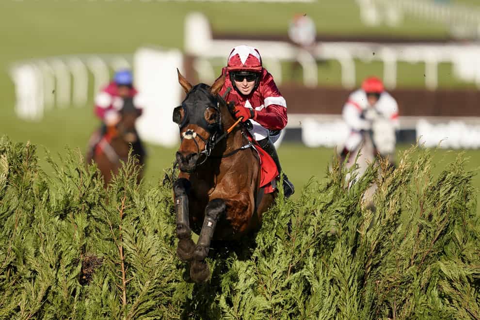Keith Donoghue riding Tiger Roll clears the last to win The Glenfarclas Chase during day two of the Cheltenham Festival at Cheltenham Racecourse 2021 (Alan Crowhurst/PA)