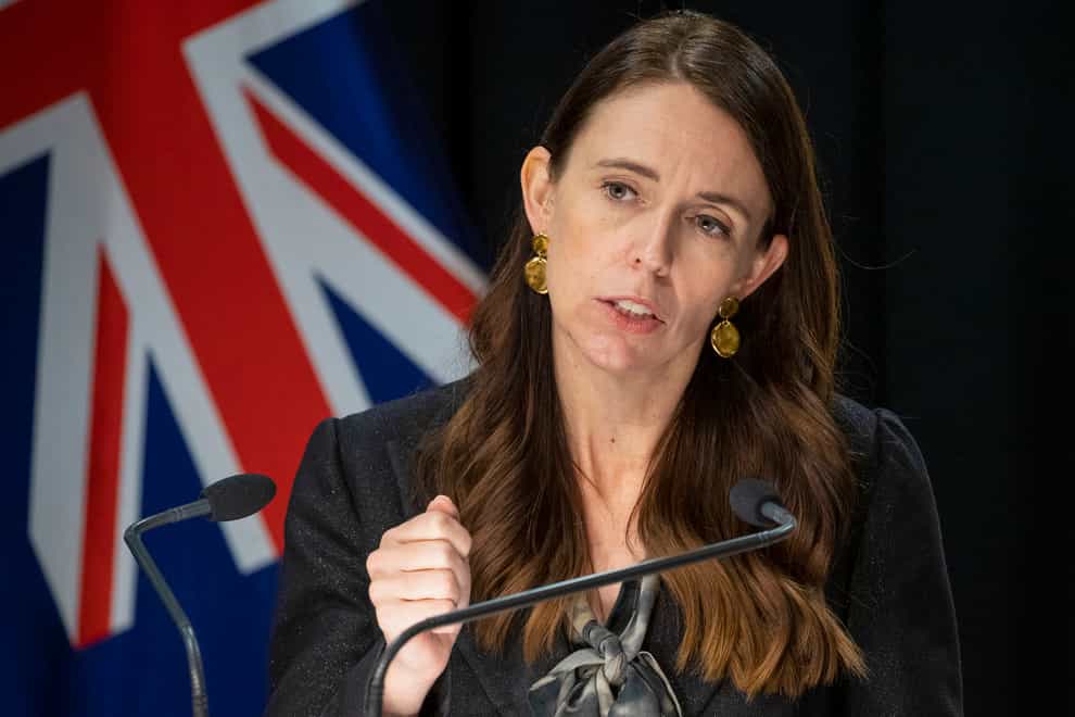 New Zealand Prime Minister Jacinda Ardern said on Wednesday her nation was “ready to welcome the world back” with most tourists allowed to return by May as the nation continues to ease its coronavirus restrictions (Mark Mitchell/Pool Photo via AP)
