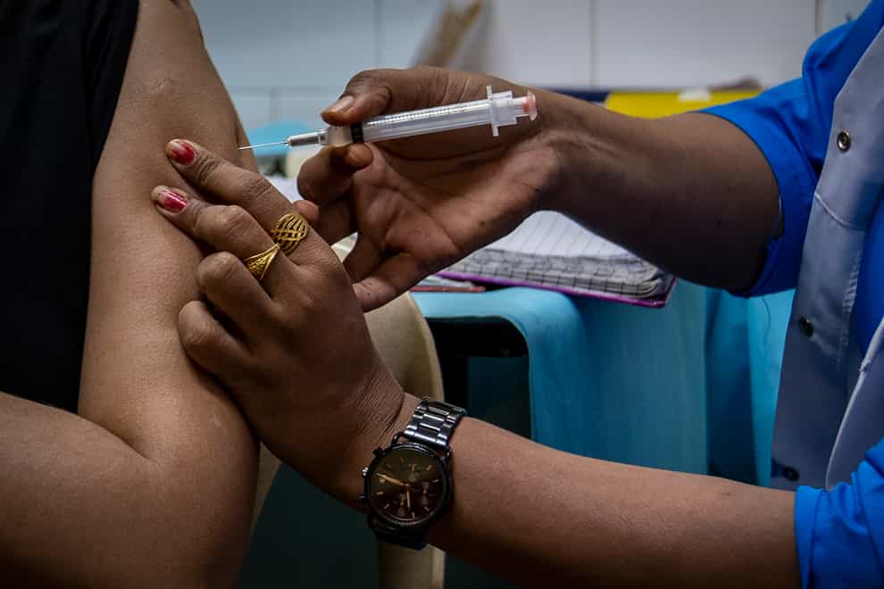 The World Health Organisation said the number of new coronavirus deaths reported worldwide fell by 17% in the last week but Covid-19 infections rose (Altaf Qadri/AP)