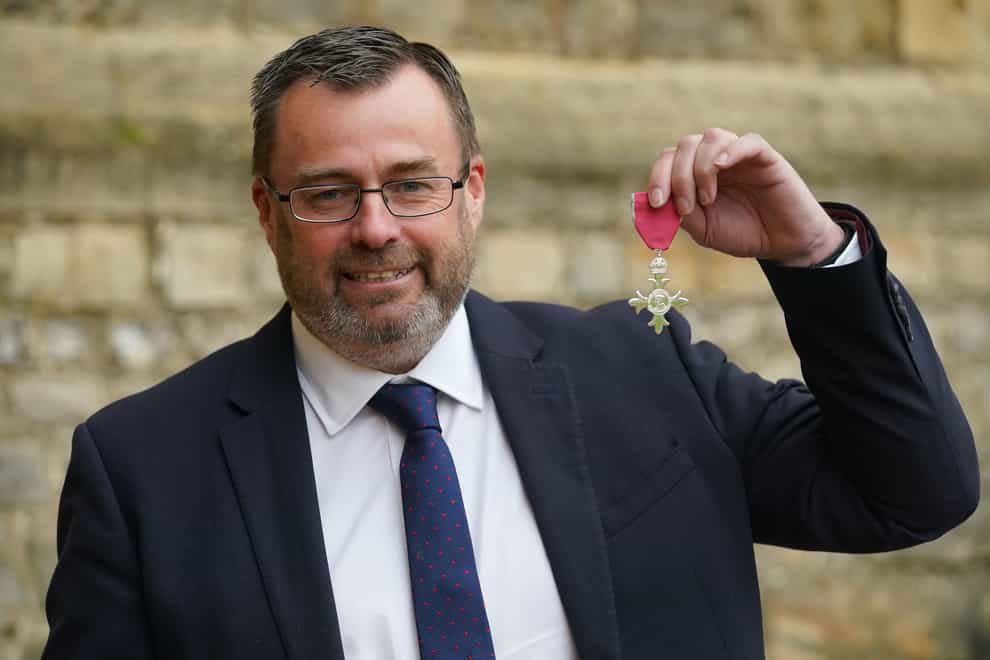 Martyn Phillips shows off his MBE (Jonathan Brady/PA)