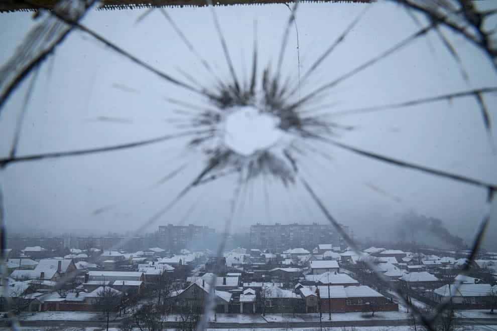 Glass on a hospital window is shattered by shelling in Mariupol, Ukraine (Evgeniy Maloletka/AP)