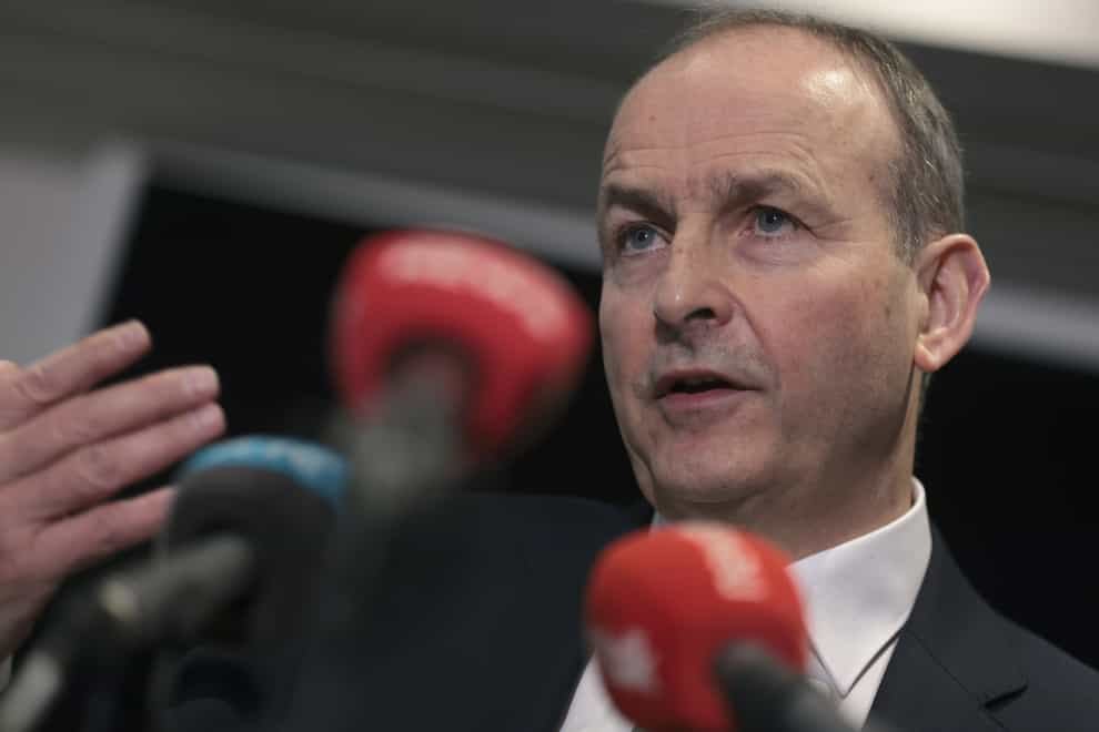 Taoiseach Micheal Martin speaking at a press conference, during his visit to the US for St Patrick’s Day, before he tested positive for Covid (Oliver Contreras/PA)