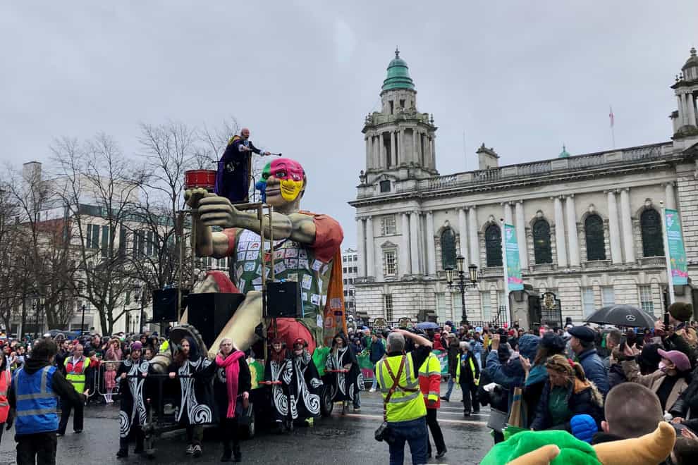Rain failed to dampen spirits in Belfast as the St Patrick’s Day parade returned to the city after a three-year absenc (David Young/PA)