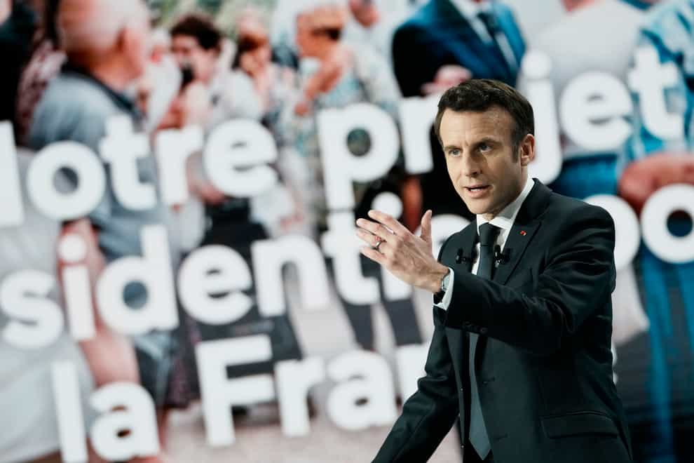 French President Emmanuel Macron delivers his speech during a presidential campaign news conference in Aubervilliers, north of Paris (Thibault Camus/AP)