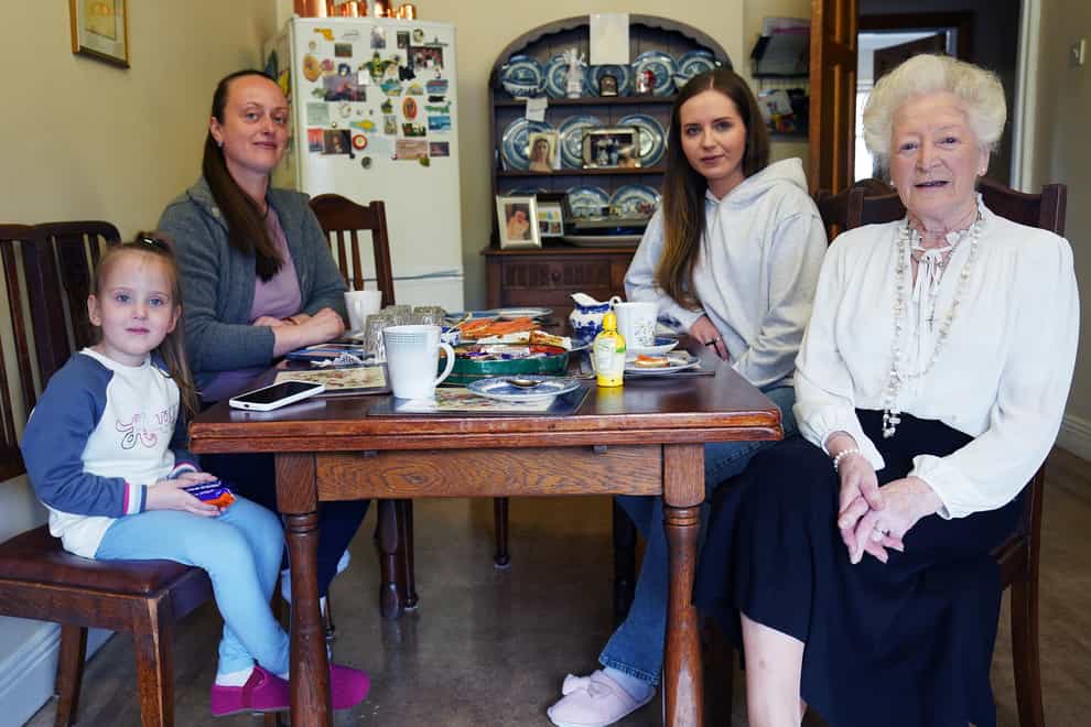 Phyliss McDonagh with Viktoria Kasianenko (back left), her four-year-old daughter Barbara Yevlakhova and step-daughter Anna Yevlakhova, 32, at her home in Dublin (Brian Lawless/PA)