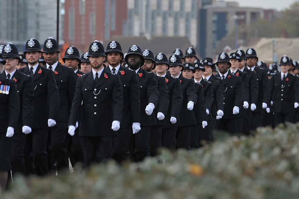Metropolitan Police recruits marching during a Metropolitan Police passing out parade for new officers at Peel House in Hendon (Nick Ansell/PA)