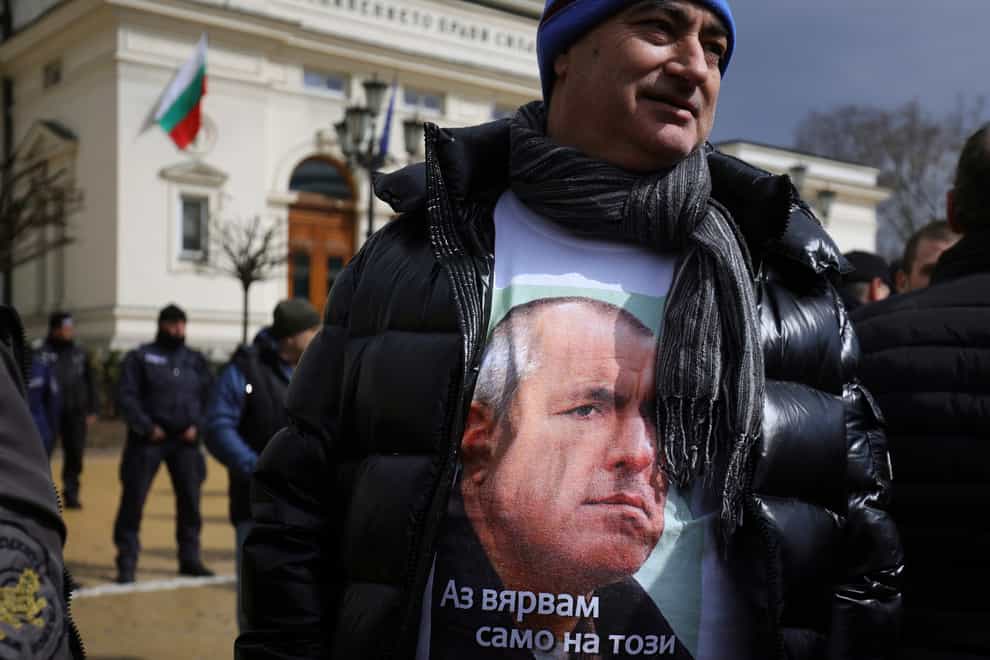 A supporter of former prime minister Boyko Borissov wears a T-shirt demanding his release (AP Photo/Valentina Petrova)