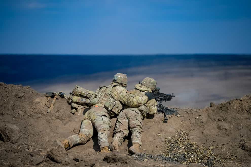 US soldiers take part in an exercise (Alexandru Dobre/AP)