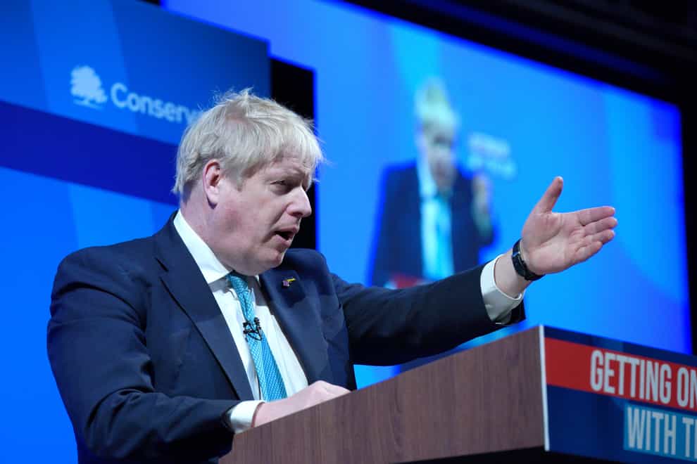 Prime Minister Boris Johnson acknowledges his supporters after speaking at the Conservative Party spring conference (Peter Byrne/PA)