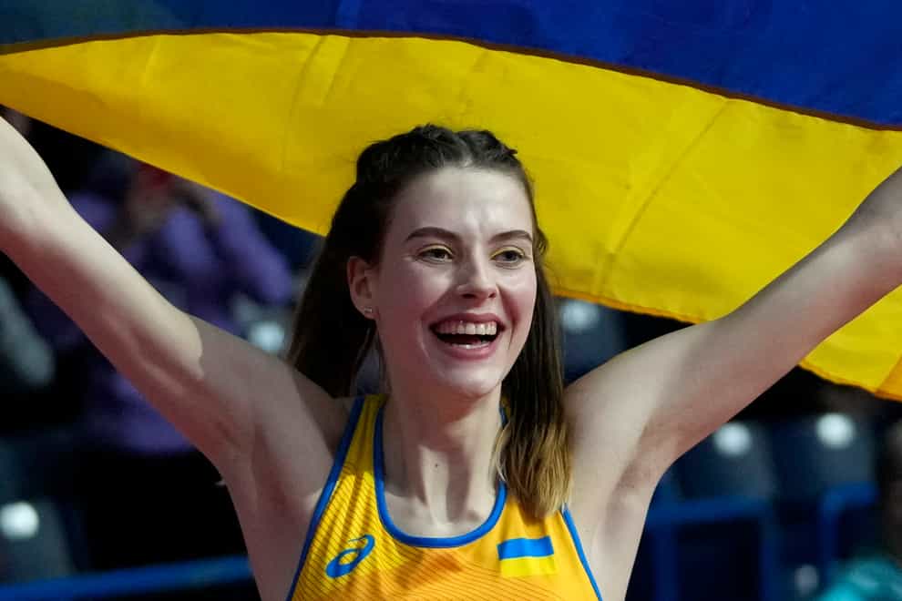 Ukraine’s Yaroslava Mahuchikh celebrates winning high jump gold at the World Indoor Championships in Belgrade (AP/Darko Vojinovic).