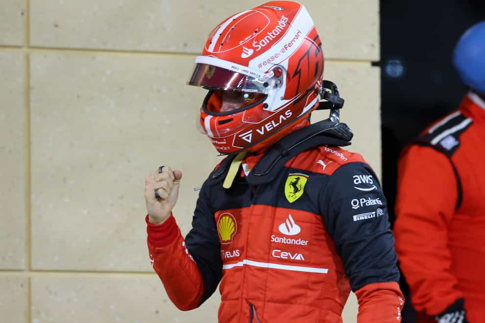 Charles Leclerc celebrates claiming pole position (Giuseppe Cacace/AP)