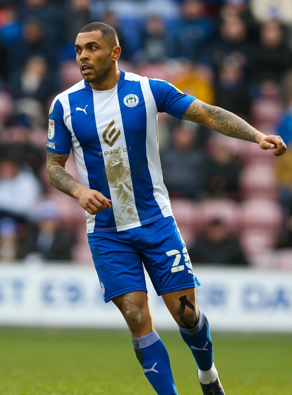 Josh Magennis opened the scoring as Wigan thrashed Morecambe (Barrington Coombs/PA)
