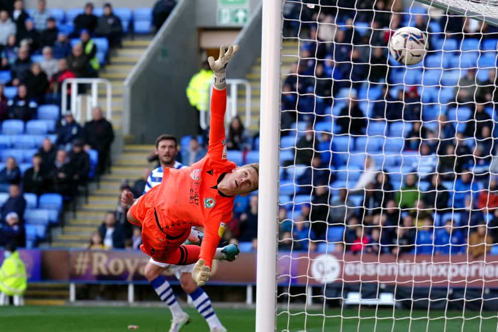 Blackburn goalkeeper Thomas Kaminski fails to stop Reading’s Josh Laurent scoring (John Walton/PA)
