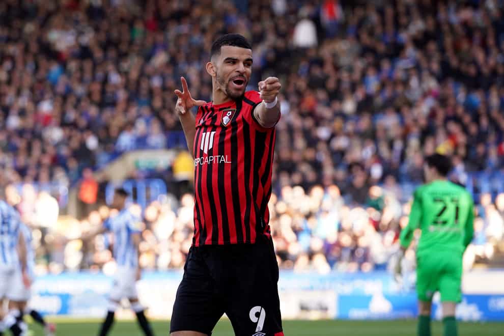 Dominic Solanke celebrates scoring Bournemouth’s third goal in a 3-0 win at Huddersfield (Martin Rickett/PA Images).