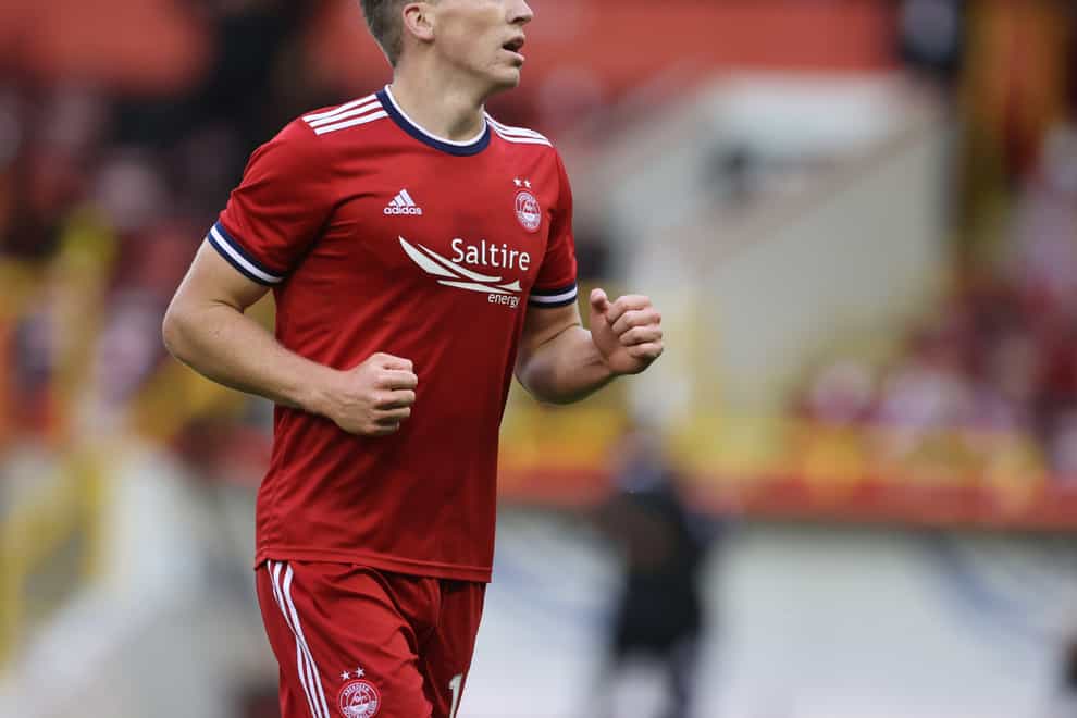 Lewis Ferguson scored two penalties as Aberdeen came from behind to beat 10-man Hibernian 3-1 (Steve Welsh/PA Images).