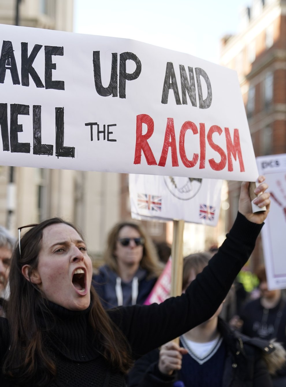 Demonstrators took to the streets to protest over the treatment of the girl on UN Anti-Racism Day (Andrew Matthews/PA)