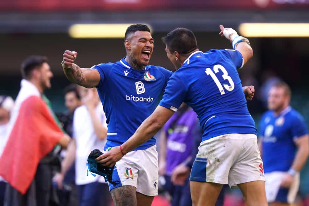 Italy players Monty Ioane, left, and Ignacio Brex Juan celebrate their Six Nations victory over Cardiff (Mike Egerton/PA)