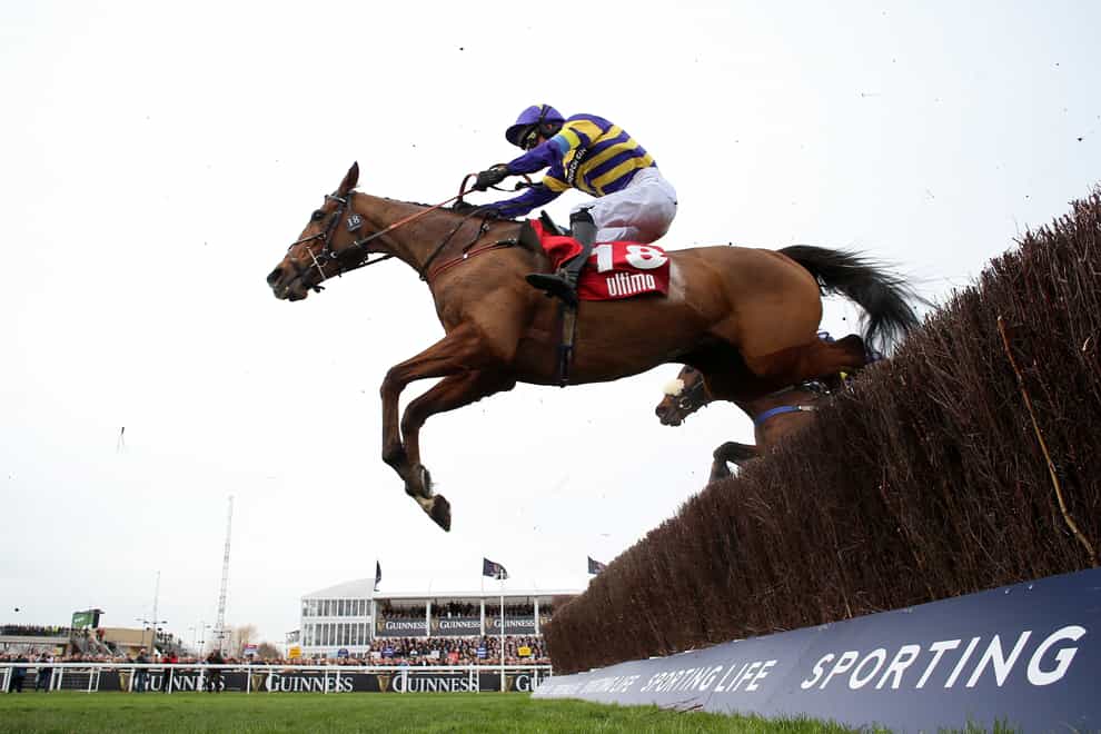 Corach Rambler and Derek Fox on their way to winning the Ultima Handicap Chase (Nigel French/PA)