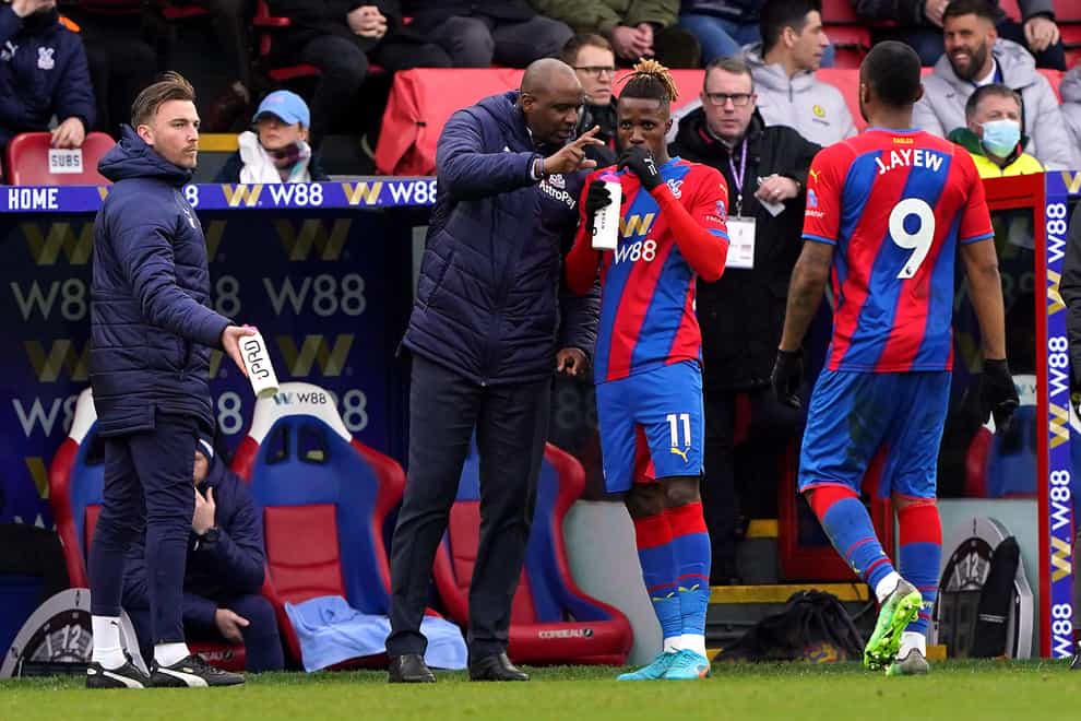 Wilfried Zaha, right, is excited by Crystal Palace’s future under Patrick Vieira (Jonathan Brady/PA)