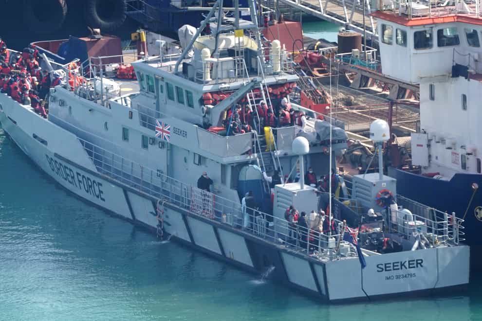 A group of people thought to be migrants are brought in to Dover, Kent, onboard a Border Force vessel following a small boat incident in the Channel (Gareth Fuller/PA)