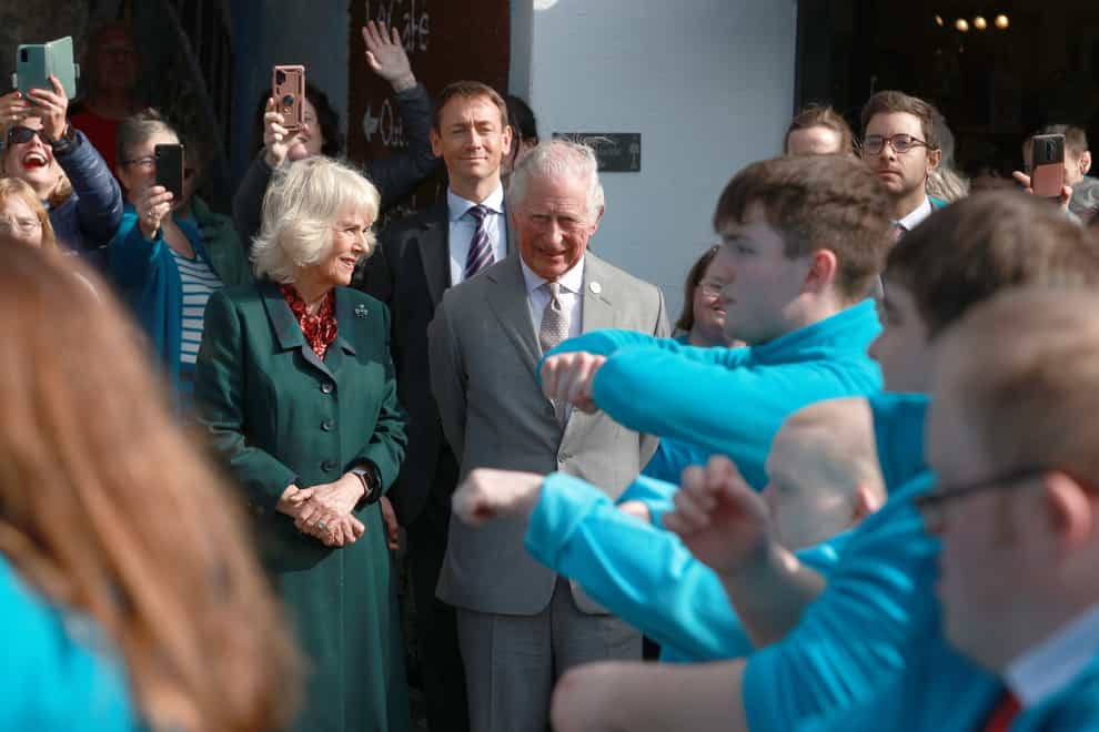 The Prince of Wales and the Duchess of Cornwall visit outside the Superstars cafe, in Cookstown, County Tyrone were they met local businesses and members of the community during their two-day visit to Northern Ireland (Liam McBurney/PA)