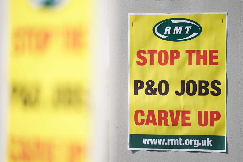 Signs erected near the Houses of Parliament, in Westminster, in protest against the decision by P&O Ferries to sack nearly 800 of its staff (Kirsty O’Connor/PA)