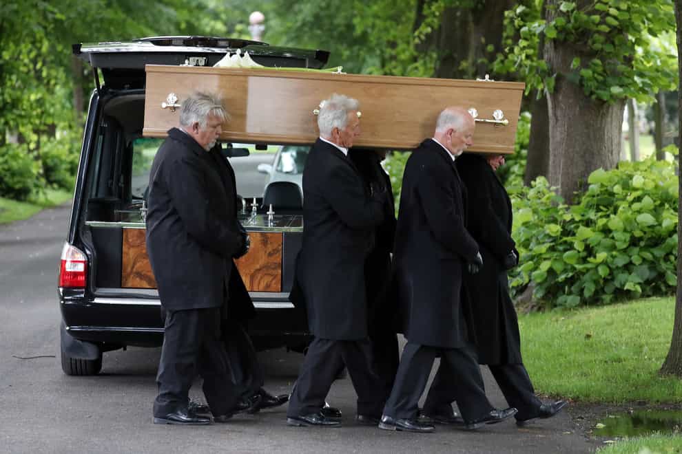 Pall-bearers carry the coffin of Jeremy Kyle guest Steve Dymond during his funeral at Kingston Cemetery in Portsmouth (PA)