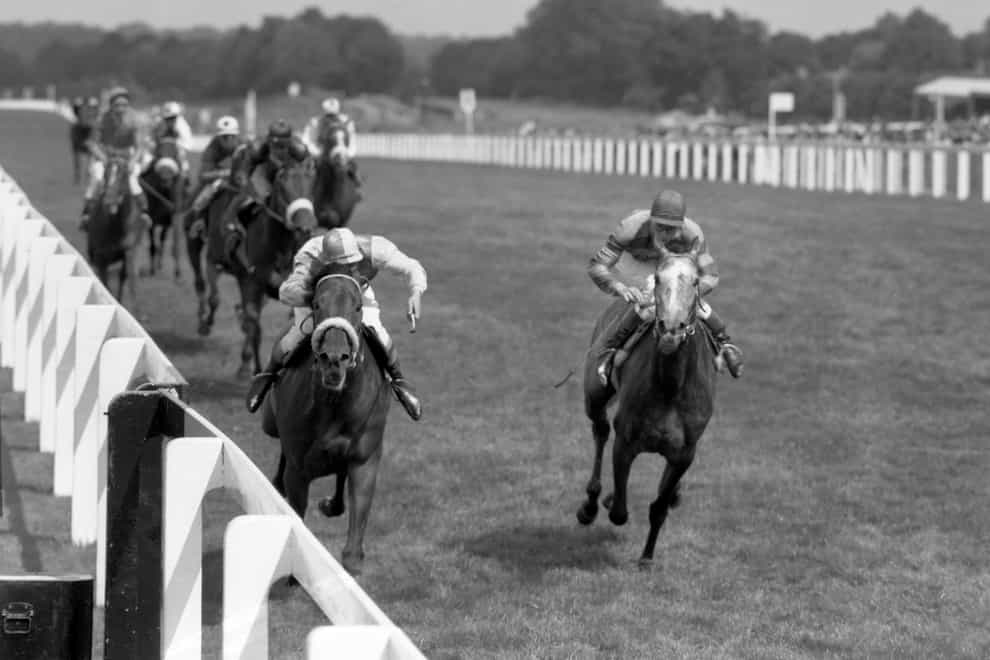 Aggressor (left) winning the King George with Jimmy Lindley on board (PA)