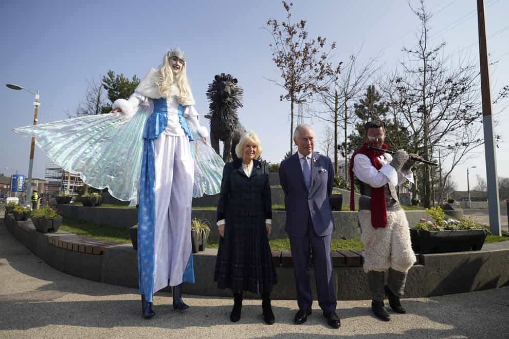 The royal couple meet performers dressed as the White Witch and Mr Tumnus (Niall Carson/PA)
