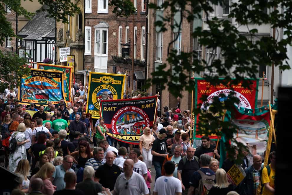 Bands and banners parade through Durham during the Durham Miners’ Gala (Owen Humphreys/PA)