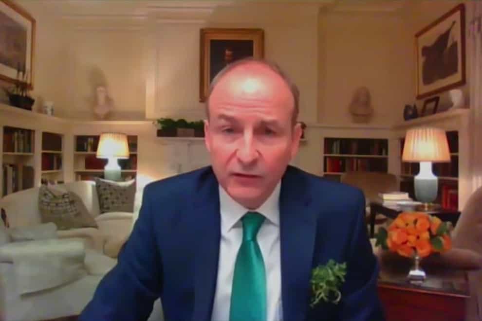 Handout screengrab from video issued by The White House of the bilateral meeting between Taoiseach Micheal Martin and US President Joe Biden via videolink. Mr Martin will now leave isolation to attend an EU summit (The White House/PA)