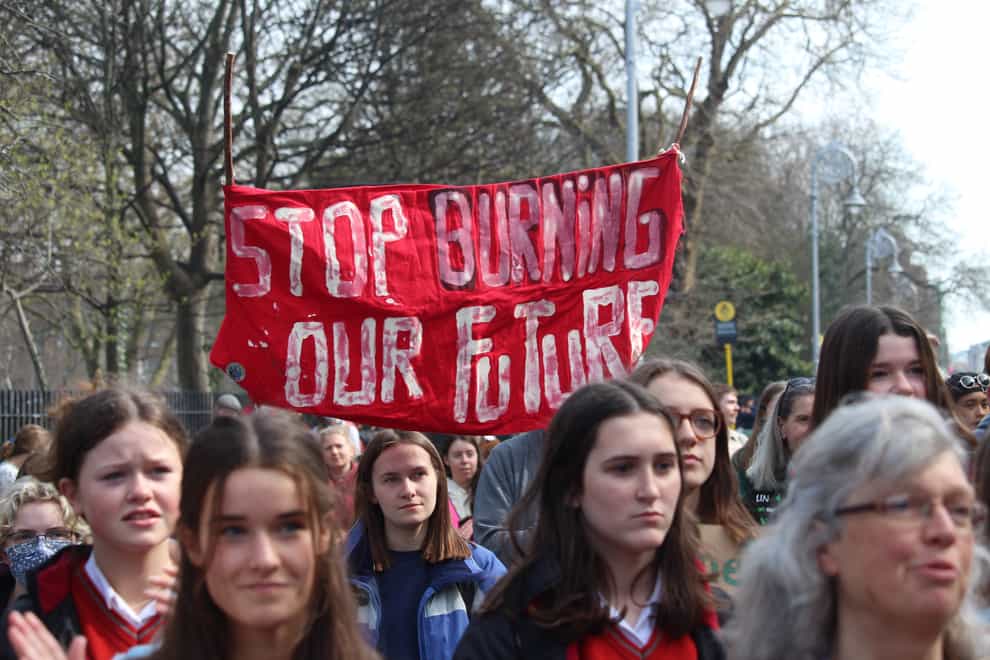 Hundreds of young people gathered in Merrion Square in Dublin city centre on Friday as part of a global climate strike (Dominic McGrath/PA)