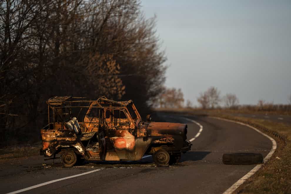 A burned Ukranian army vehicle (Petros Giannakouris/AP)