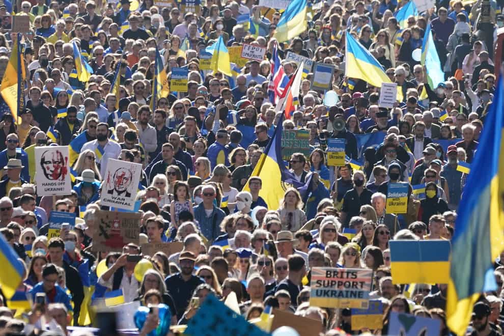 People take part in a solidarity march in London for Ukraine, following the Russian invasion (Aaron Chown/PA)