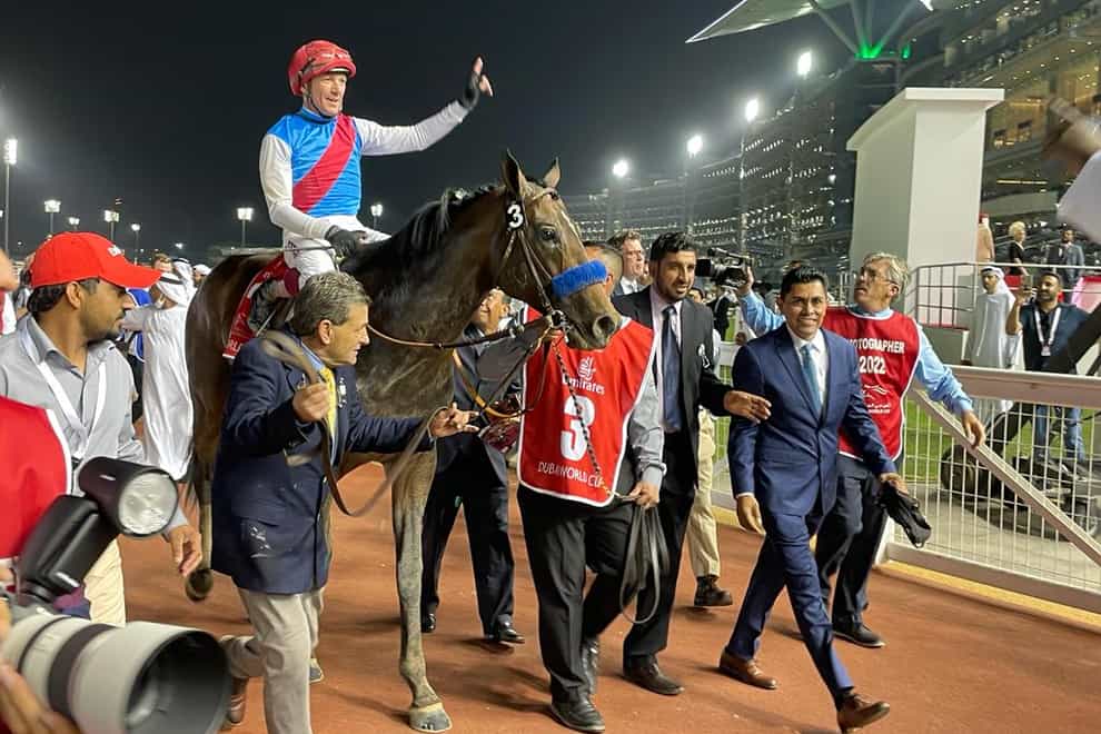 Country Grammer and Frankie Dettori after winning the Dubai World Cup (Neil Morrice/PA)