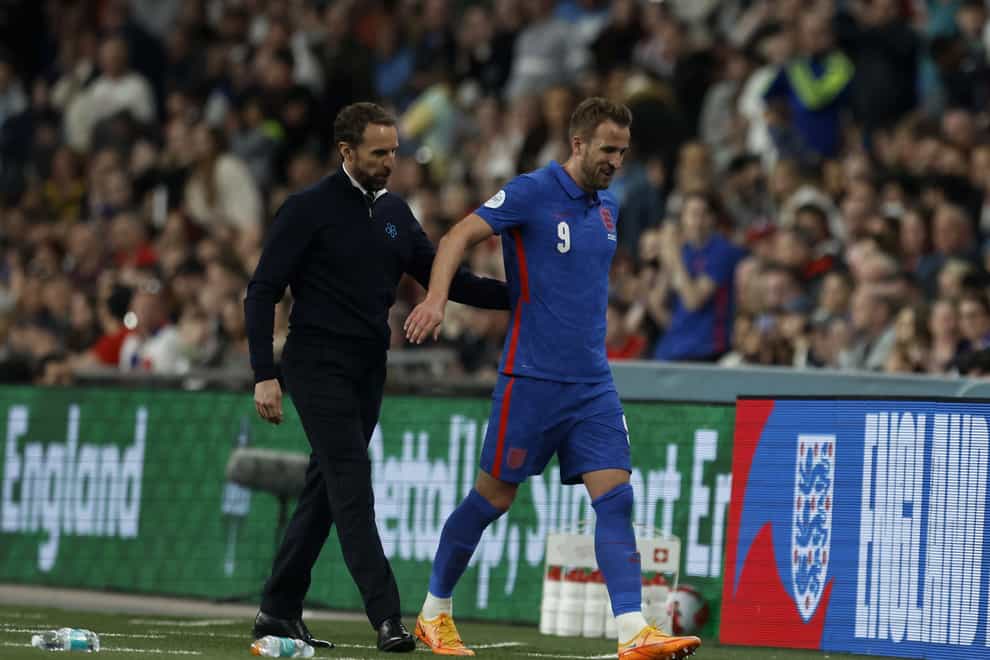 England’s Harry Kane is congratulated by his manager Gareth Southgate after being substituted during the Alzheimer’s Society international match at Wembley Stadium, London. Picture date: Saturday March 26, 2022.