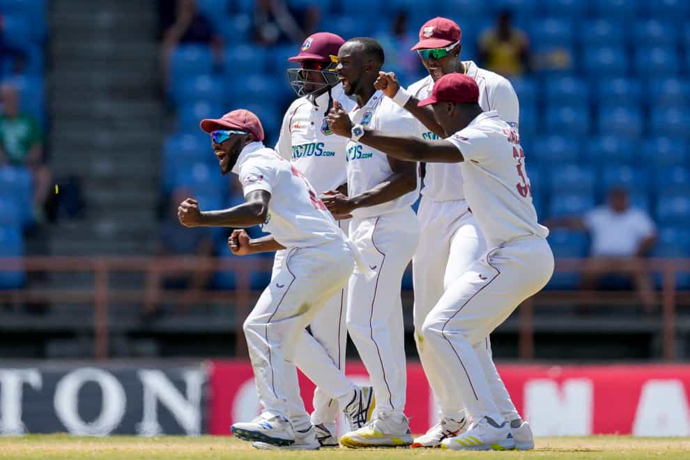 West Indies’ Kemar Roach celebrates the dismissal of England’s Jack Leach (Ricardo Mazalan/AP).
