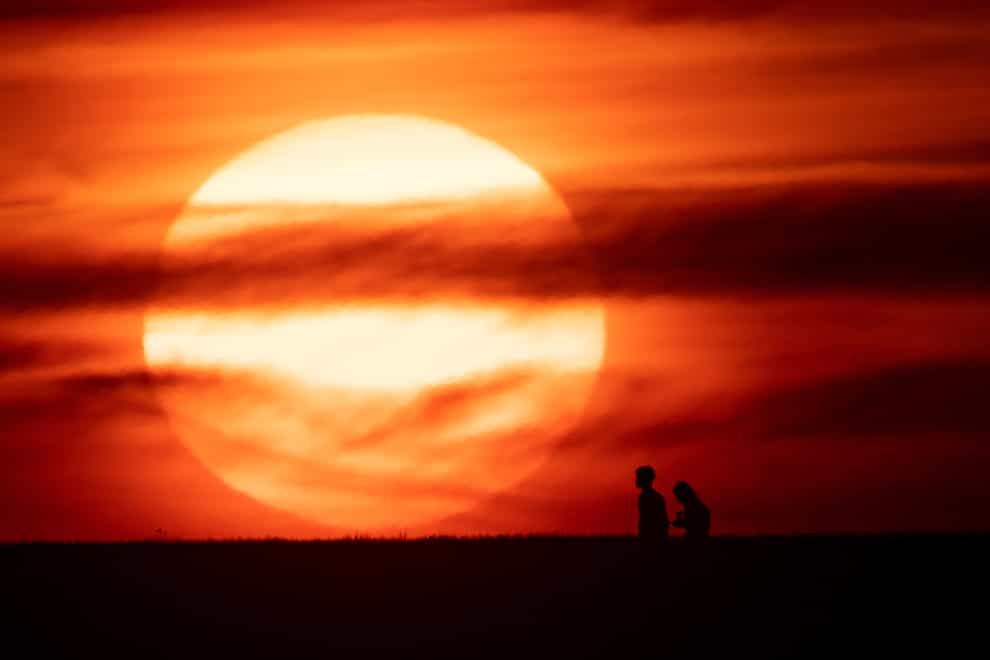 Heatwave temperature thresholds are rising in parts of England (Jacob King/PA)