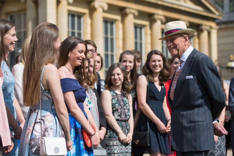 The Duke of Edinburgh greets guests at the Duke of Edinburgh’s Award gold award presentations, at Buckingham Palace (Dominic Lipinski/PA)