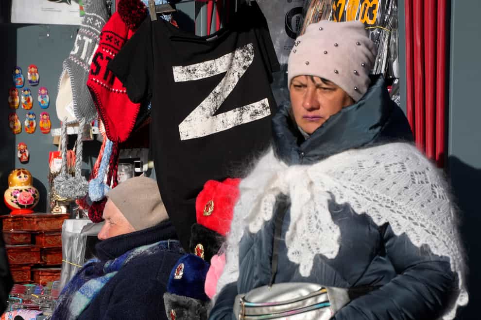 A T-shirt with the letter Z, which has become a symbol of the Russian military, is displayed at a street souvenir shop in St Petersburg (AP)