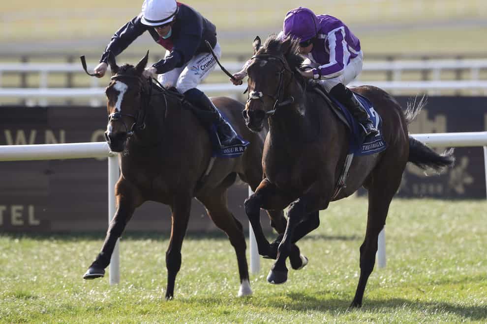 Insinuendo (left) and Mother Earth fight out the finish (Lorraine O’Sullivan/PA)