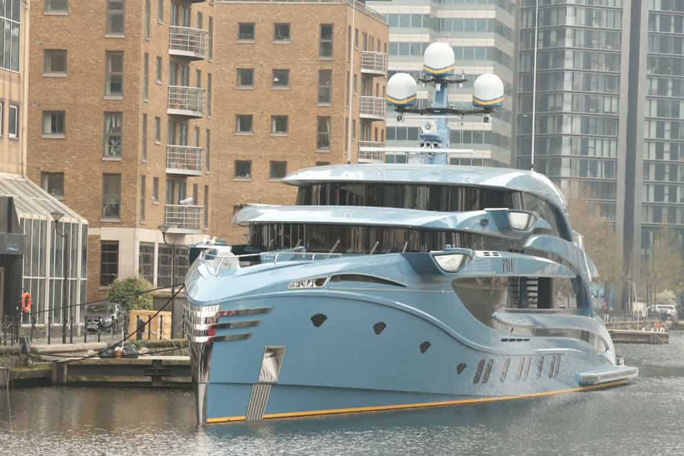 The superyacht Phi owned by a Russian businessman in Canary Wharf, east London, has been impounded (James Manning/PA)