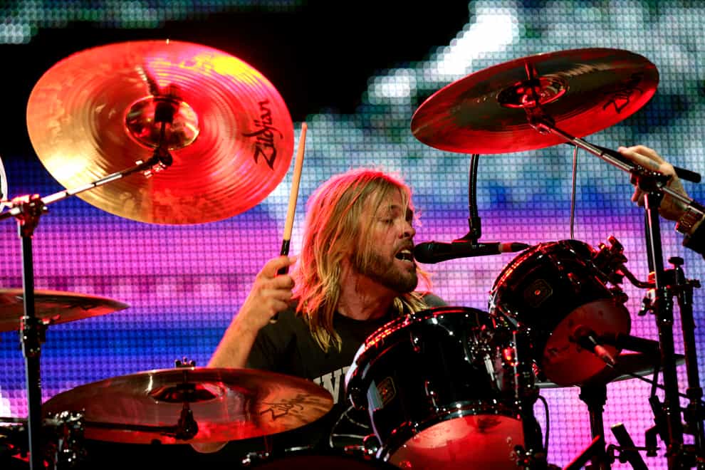 The Foo Fighters performing live at the V Festival (PA)