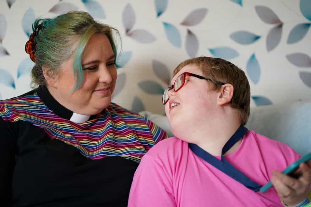 Rev Charlotte Cheshire with her son Adam (Jacob King/PA)