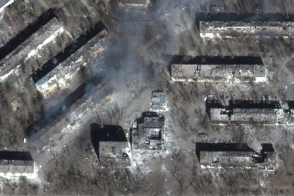 Damage to residential buildings seen in Mariupol (Satellite image ©2022 Maxar Technologies/PA)