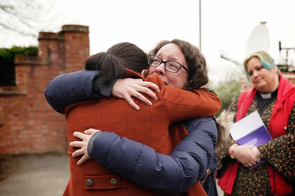 Rhiannon Davies (left) embraces Kayleigh Griffiths following the release of the final report by Donna Ockenden, chair of the Independent Review into Maternity Services at the Shrewsbury and Telford Hospital NHS Trust (PA)