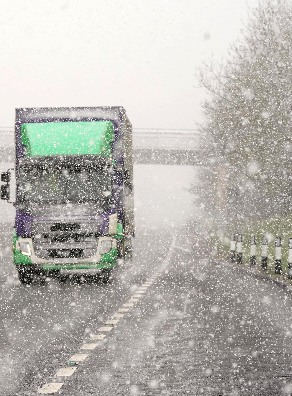 A lorry in snowy conditions on the A69 near Newscastle (Owen Humphreys/PA)
