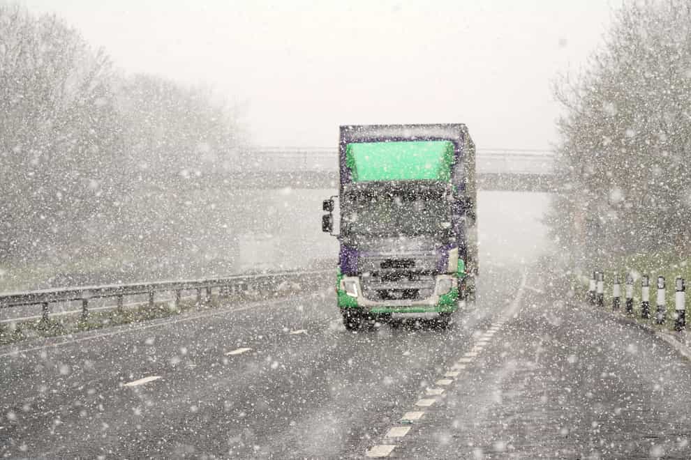 A lorry in snowy conditions on the A69 near Newscastle (Owen Humphreys/PA)