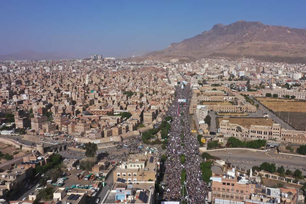 Houthi supporters attend a rally marking the seventh anniversary of the Saudi-led coalition’s intervention in Yemen’s war in Sanaa, Yemen (Abdulsalam Sharhan/AP)